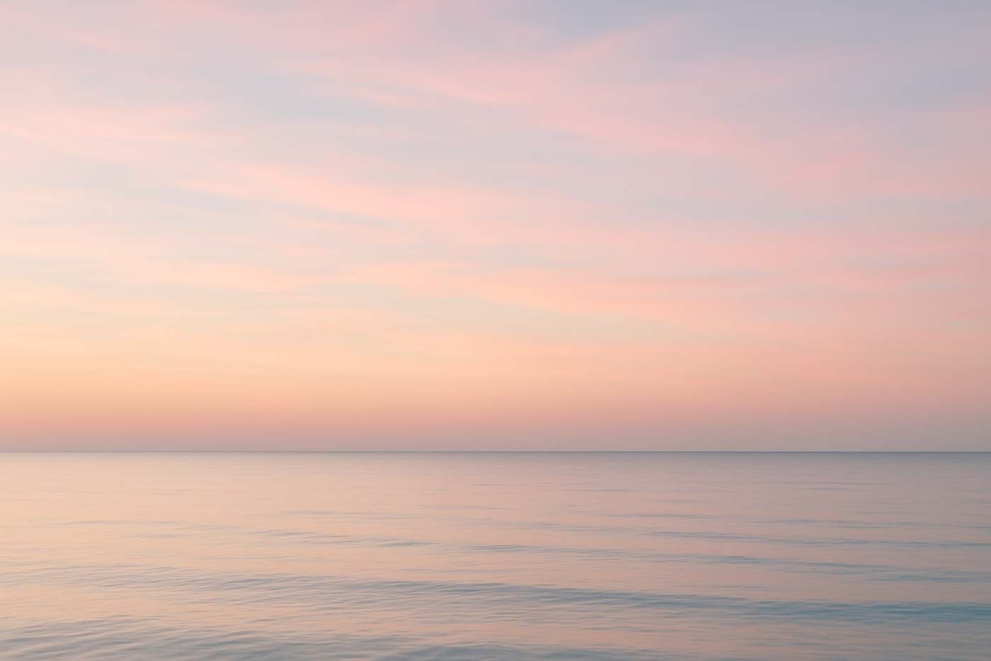 A calm sea horizon at dusk near Hialeah, FL